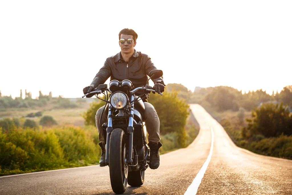 young-handsome-man-riding-motorbike-countryside-road