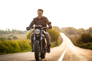 young-handsome-man-riding-motorbike-countryside-road